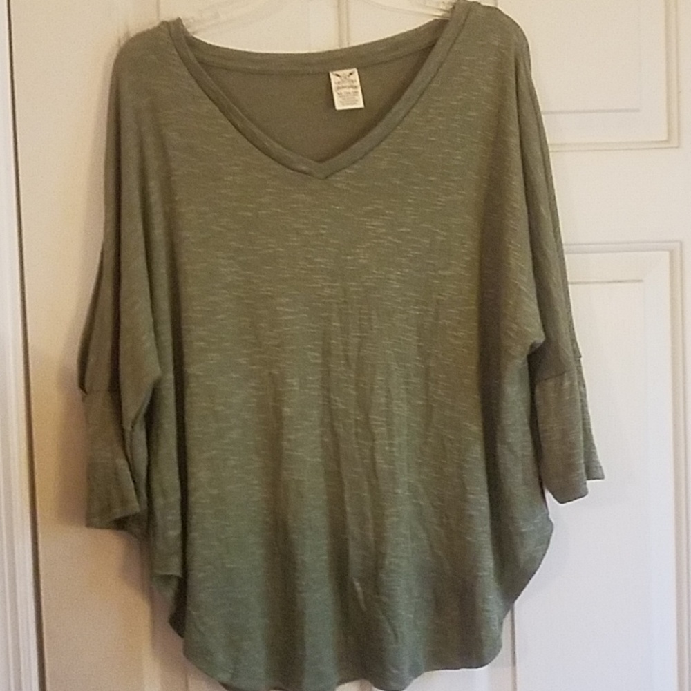 V-neck top with slits on sleeves